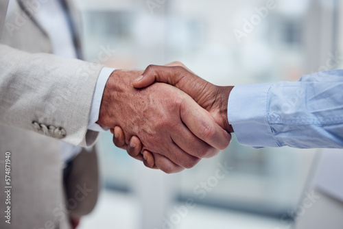 Handshake, meeting and business people with a welcome, thank you and corporate onboarding. Partnership, support and employees shaking hands for a deal, trust and success in a promotion at work