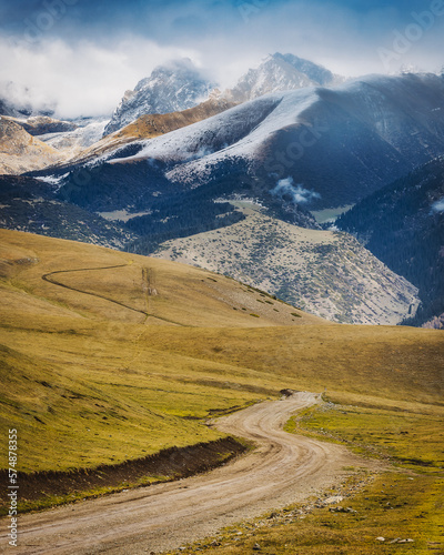 Scenic road in mountains of Kyrgyzstan, autumn landscape