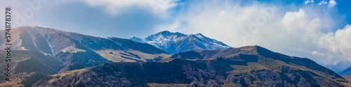 Panorama view of mountains covered with snow in Kyrgyzstan