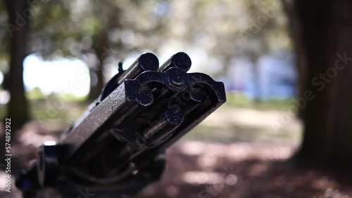 A Gatling gun statue at white point gardens in Charleston, SC photo
