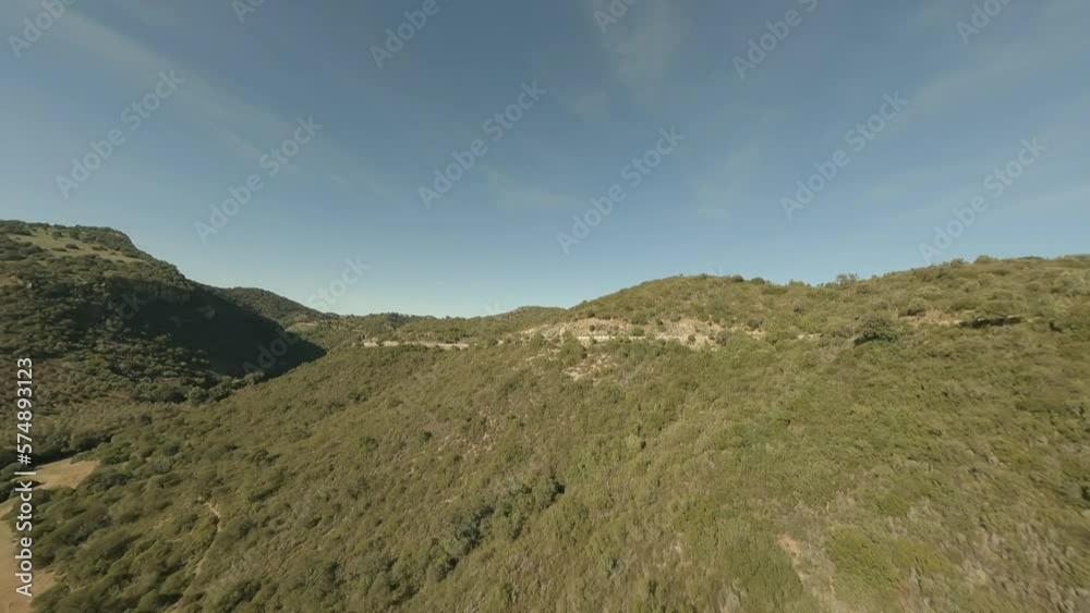 High frame rate flight near winding highway in Spanish countryside High frame rate flight near winding highway in Spanish countryside