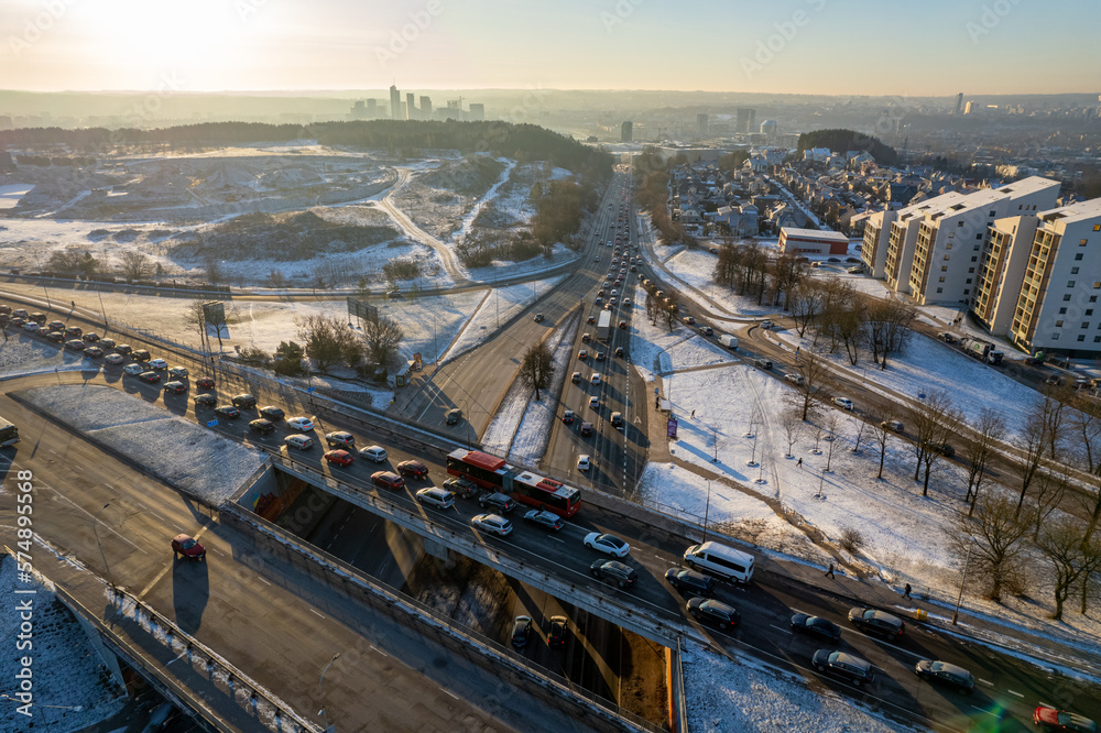 Aerial beautiful winter morning view of traffic jam in Seskine district, Vilnius, Lithuania