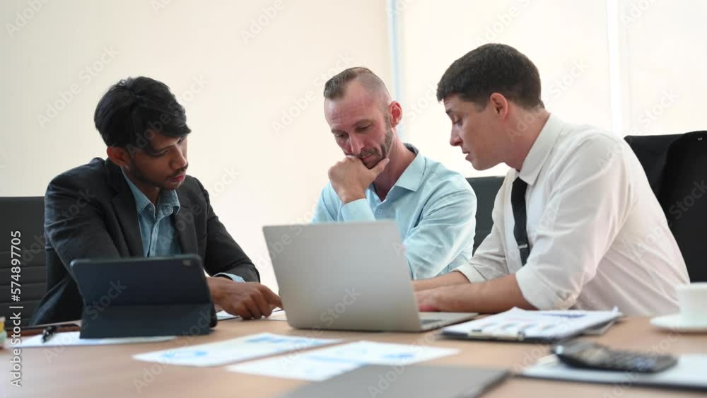Office colleagues have a casual discussion. During a meeting in a conference room, a group of business teem sit in the conference room . Office colleagues have a casual discussion. During a meeting in a conference room, a group of business teem sit in the conference room .