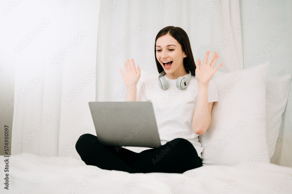 Beautiful woman resting and watching movie in bed at bedroom in morning Lifestyle at home Beautiful woman resting and watching movie in bed at bedroom in morning Lifestyle at home