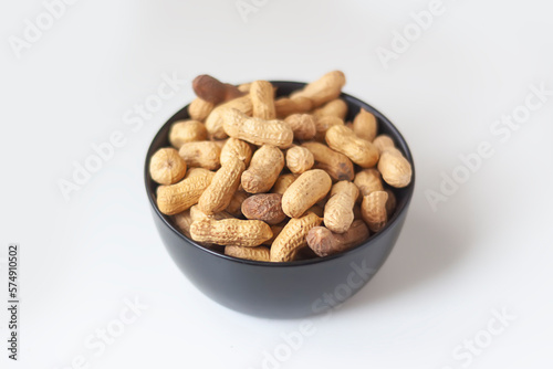 Unpeeled nuts close up. Peanuts.