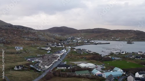 Static drone shot of Castlebay and the surrounding area. Filmed at Castlebay on the Isle of Barra, part of the Outer Hebrides of Scotland. photo