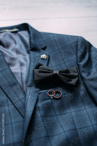 A plaid jacket and a bow tie 4401.