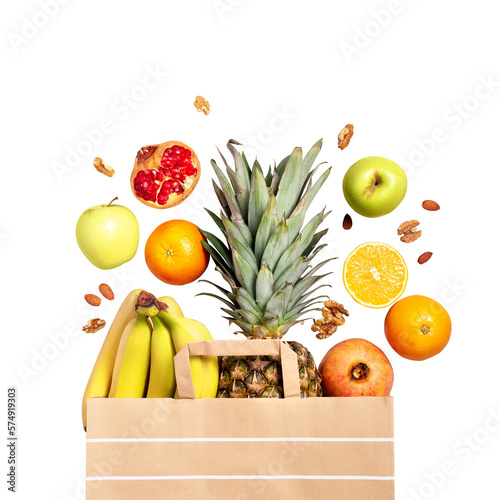 Fresh summer fruits in paper bag isolated, minimal creative style, levitation, flying fruits, copy space. Food groceries in bio package