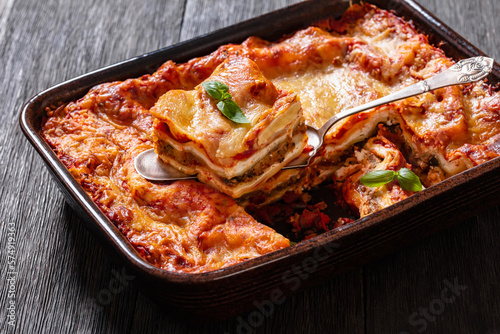 Fotografie portion of Lasagna in baking dish, top view