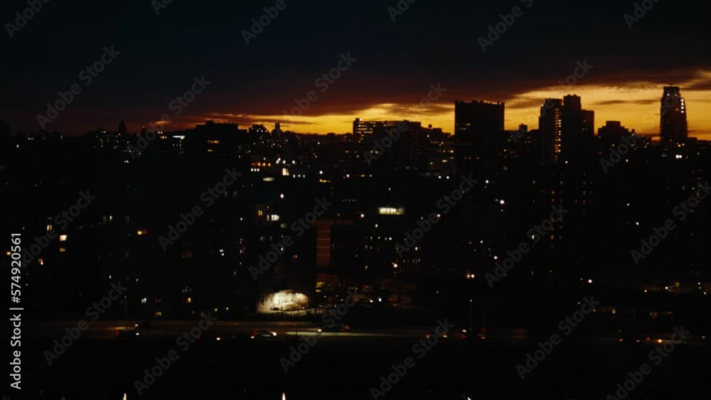 New York City skyline sunset over buildings, day to night, time lapse New York City skyline sunset over buildings, day to night, time lapse