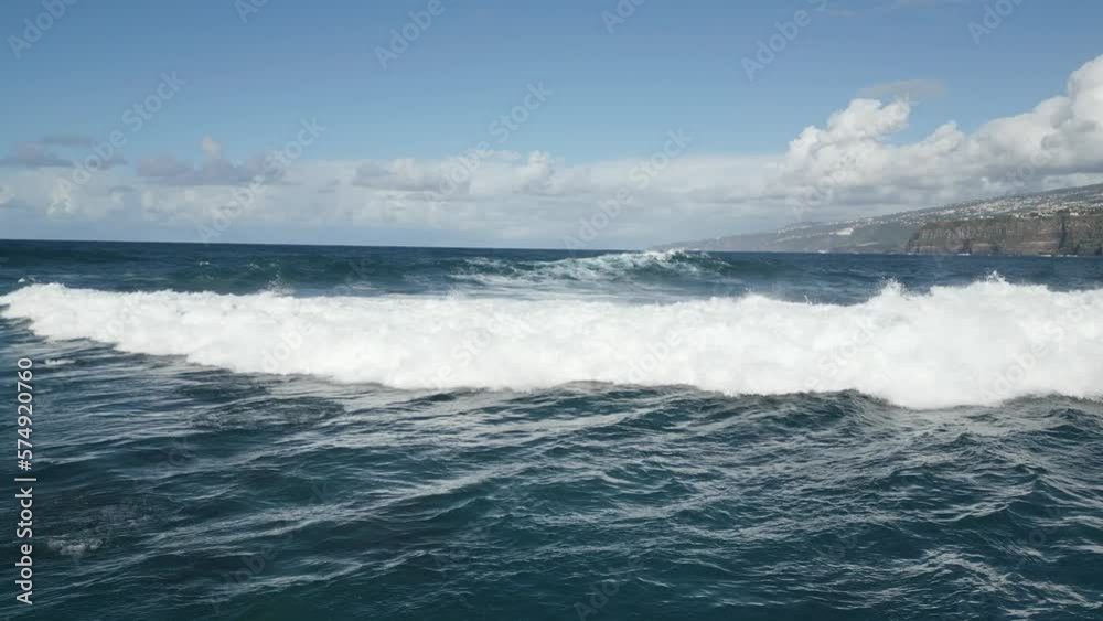 Drone Flying Over Big Wave Fading Into Blue Ocean, Puerto de La Cruz, Spain Drone Flying Over Big Wave Fading Into Blue Ocean, Puerto de La Cruz, Spain