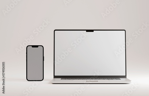 High end phone and laptop on white studio backdrop. Blank mockup template screen. 
