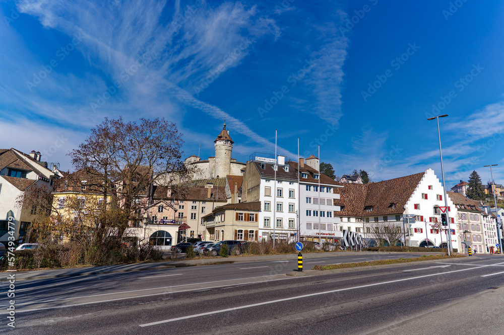 Fototapeta premium Famous Munot fortification on a hill at Swiss City of Schaffhausen on a sunny winter day. Photo taken February 16th, 2023, Schaffhausen, Switzerland.