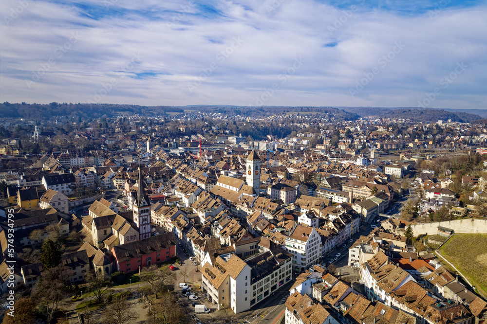 Aerial view of City of Schaffhausen with the old town in the foreground on a blue cloudy winter day. Photo taken February 16th, 2023, Schaffhausen, Switzerland.