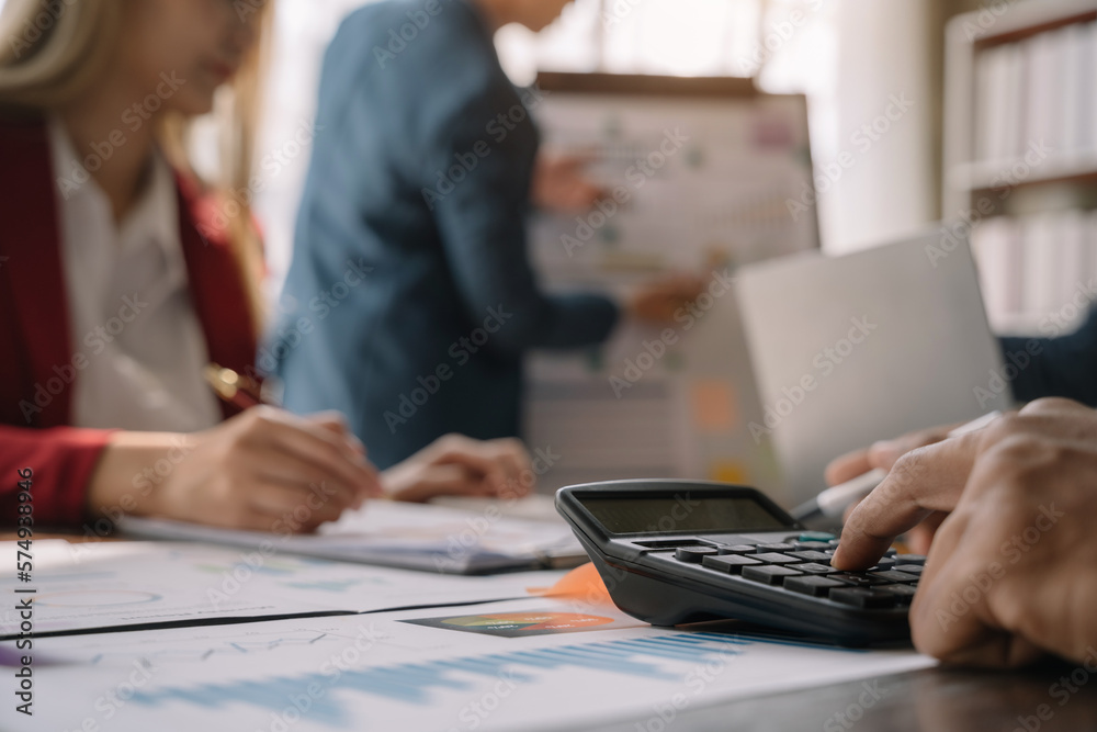 business people discussing on performance revenue in meeting. businessman working with co-worker team. financial adviser analysing data with investor. business people discussing on performance revenue in meeting. businessman working with co-worker team. financial adviser analysing data with investor.