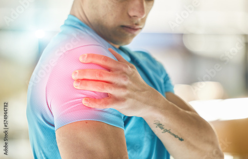 Hands, fitness injury and shoulder pain in gym after accident, workout or training exercise. Sports, health and athlete man with fibromyalgia, inflammation or painful arm, arthritis or tendinitis. photo