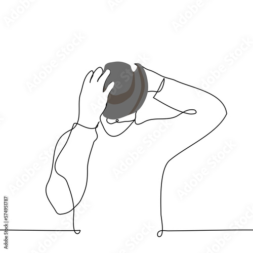 man putting on cowboy hat - one line drawing vector. concept cowboy