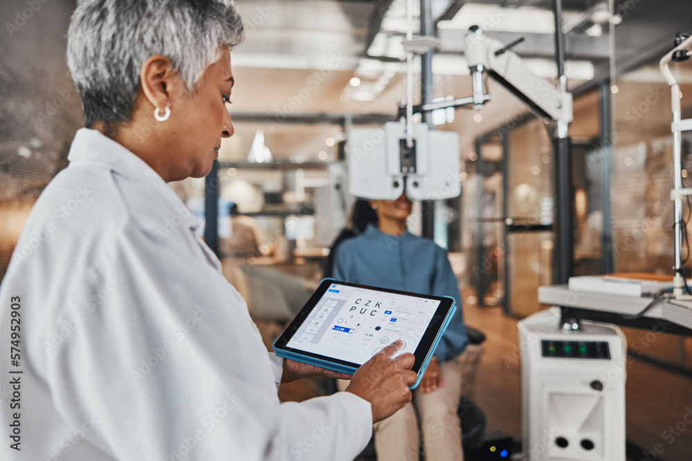 Eye test, senior doctor and tablet consulting of optometrist with woman ...
