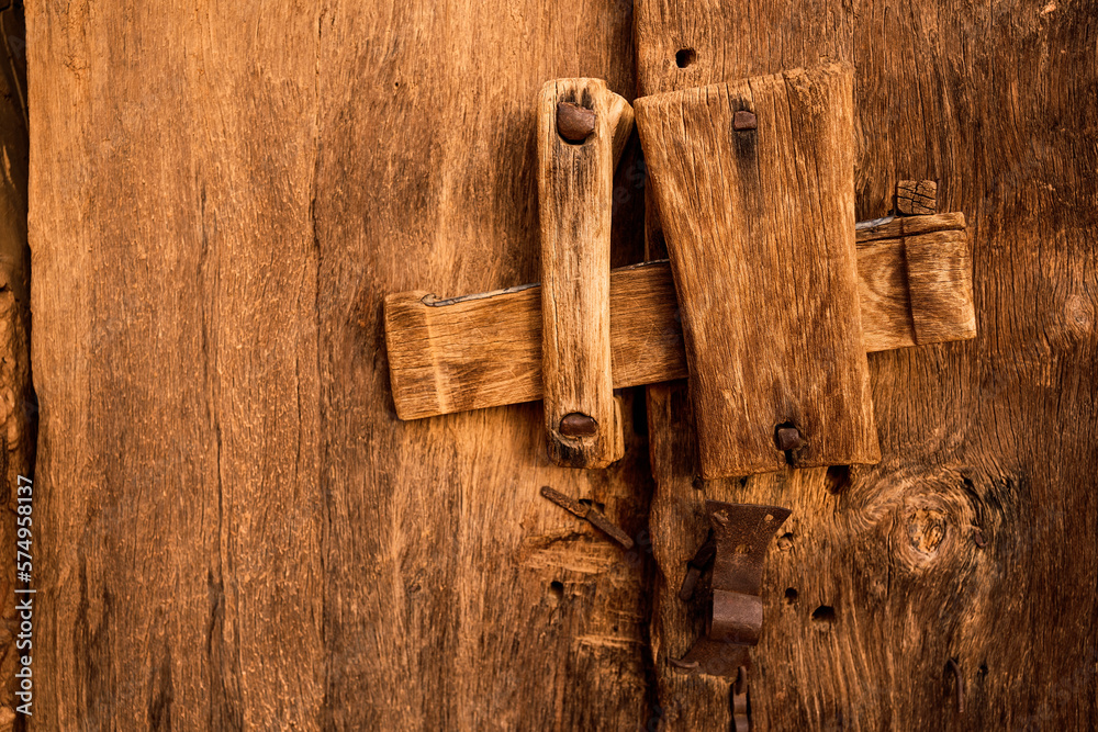 © ADDICTIVE STOCK - Medieval lock on wooden door