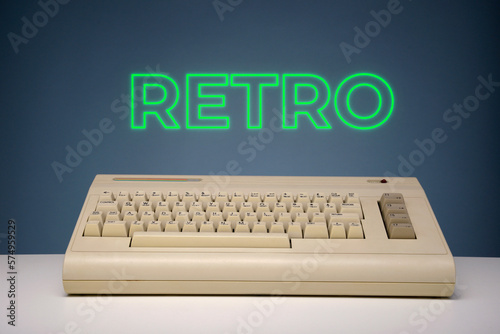 Retro computing with neon lettering photo