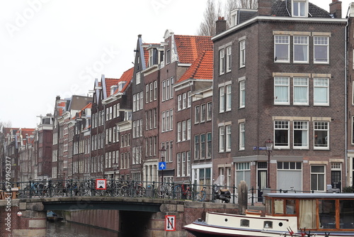 Amsterdam Recht Boomsloot Canal View with Traditional House Facades and Bridge, Netherlands