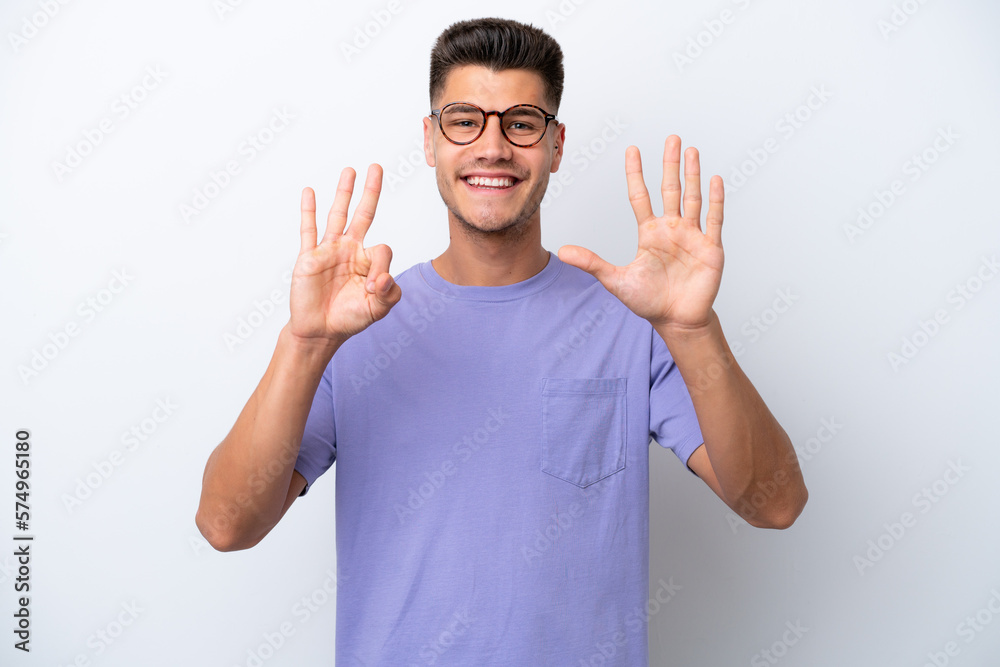 Young caucasian man isolated on white background counting eight with fingers Young caucasian man isolated on white background counting eight with fingers