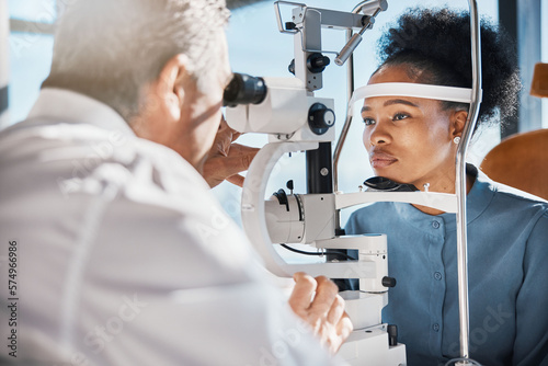 Help, eye exam or black woman consulting doctor for eyesight at optometrist or ophthalmologist. African customer testing vision with mature optician checking iris, glaucoma or retina visual health