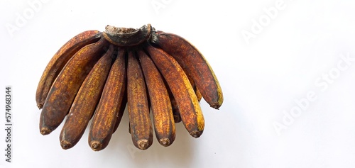 Banana fruit on a white background. in Indonesia this type of banana is called Medan banana or Pisang Barangan, this banana is widely cultivated in the area of ​​North Sumatra. Pisang medan. photo