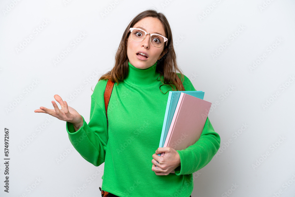 Young student caucasian woman isolated on white background with shocked facial expression Young student caucasian woman isolated on white background with shocked facial expression