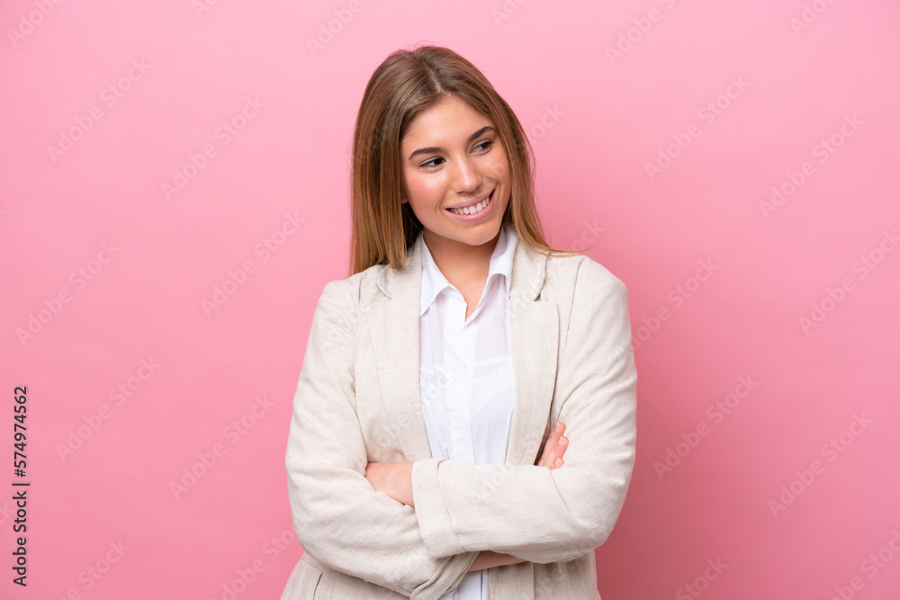 Young caucasian woman isolated on pink bakcground with arms crossed and happy Young caucasian woman isolated on pink bakcground with arms crossed and happy