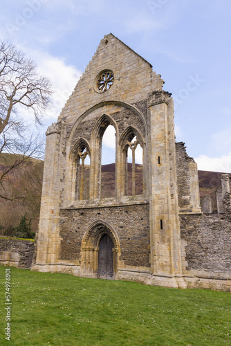 The ruins of Valle Crucis Abbey viewed dining hall. Founded as a Cistercian monastery in 1201 and closed in 1537 it is a prominent landmark in the vale of Llangollen Wales