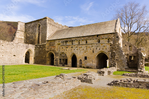 The ruins of Valle Crucis Abbey viewed dining hall. Founded as a Cistercian monastery in 1201 and closed in 1537 it is a prominent landmark in the vale of Llangollen Wales