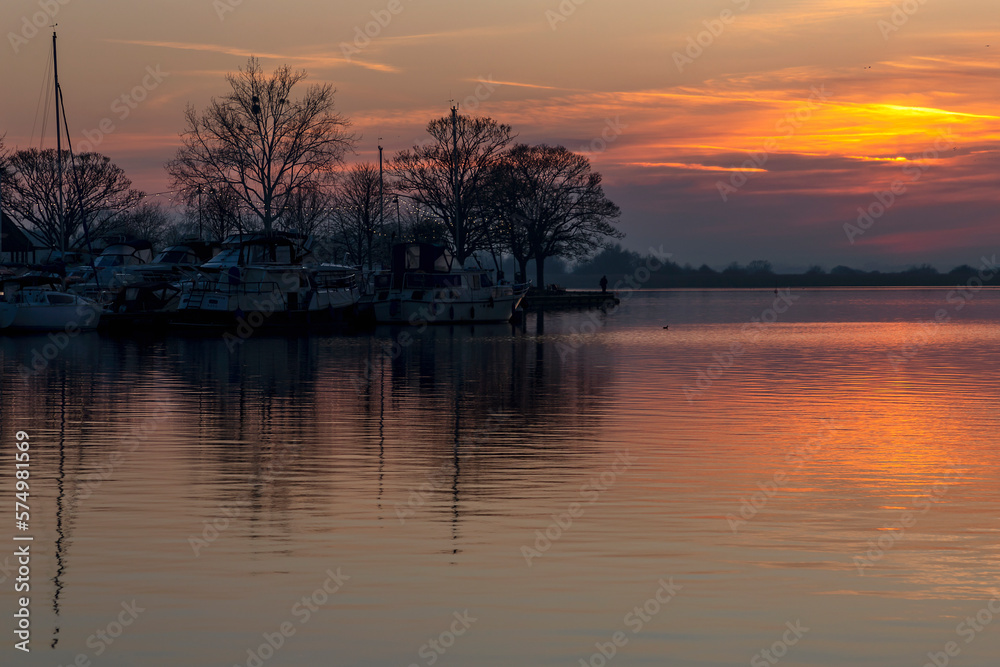 Sunset of a rural English lake.