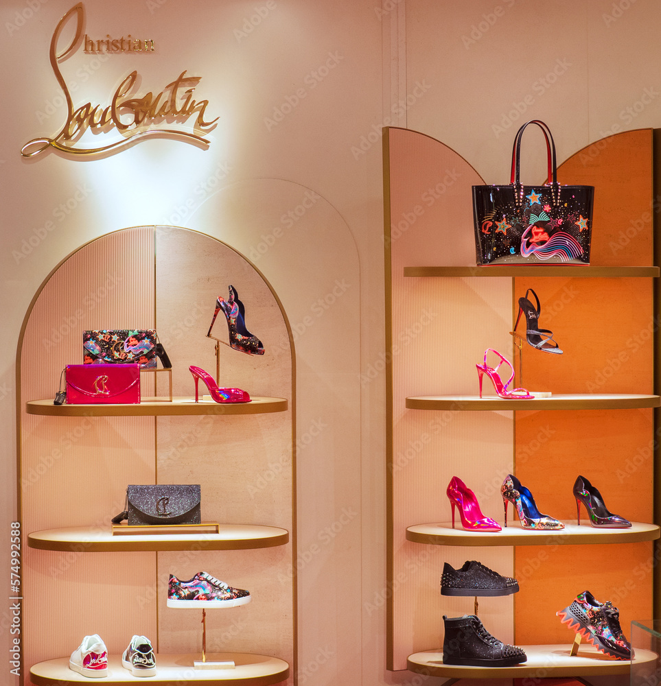 samfund Kriminel har Handbags and shoes in a Christian Louboutin fashion store.Milan -Italy,05  January 2023 Stock Photo | Adobe Stock