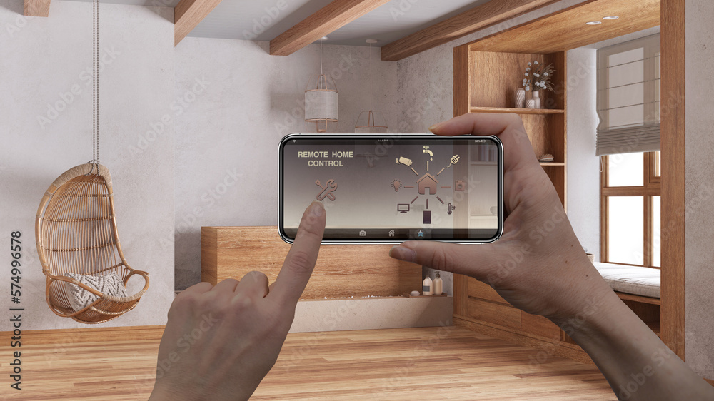 Smart remote home control system on a smart phone. Device with app icons. Interior of japandi wooden bathroom in boho style in the background, architecture design Smart remote home control system on a smart phone. Device with app icons. Interior of japandi wooden bathroom in boho style in the background, architecture design