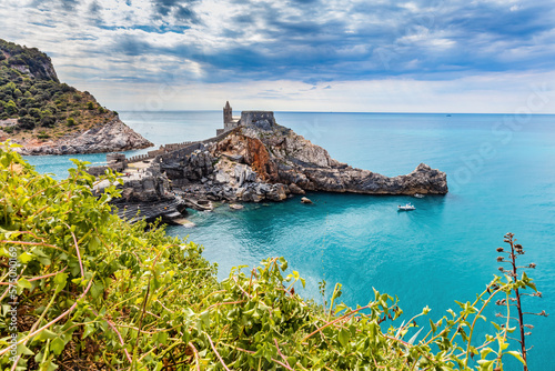 Porto Venere, Italy with church of St. Peter on cliff.