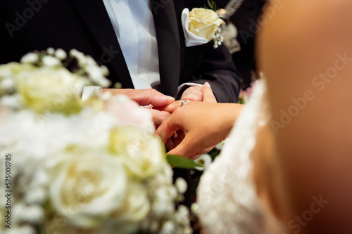 hands, wedding rings and marriage vows