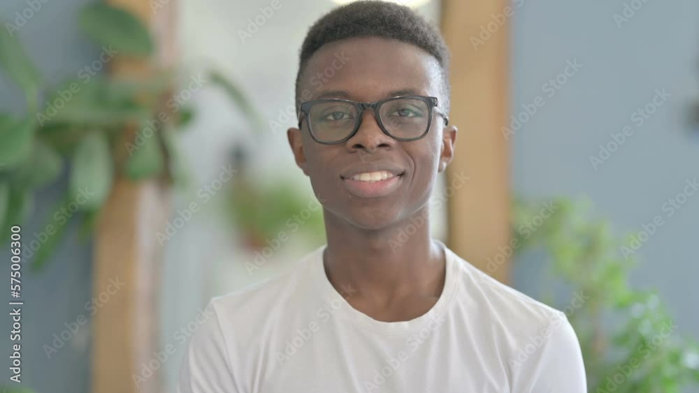 Young African Man Waving Hand to Say Hello For Video Call Young African Man Waving Hand to Say Hello For Video Call