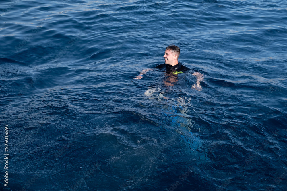 Tourists go freediving while cruising the bay. Sea excursions to the reefs of the Red Sea. snorkeling in the red sea of egypt