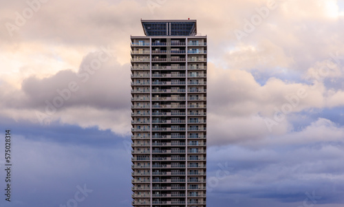 Dramatic weather and tall building after sundown