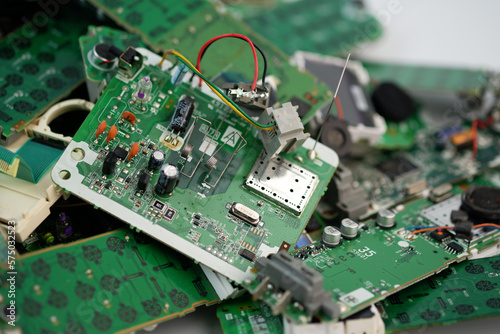 Telephone circuit board parts are being disassembled as electronic waste in the factory. electronic equipment, E-waste is a problem with environmental concepts should be reused photo