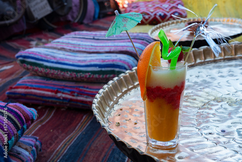 Fresh mango strawberry juice in Farsha cafe interior, Sharm El-Sheikh, Egypt.