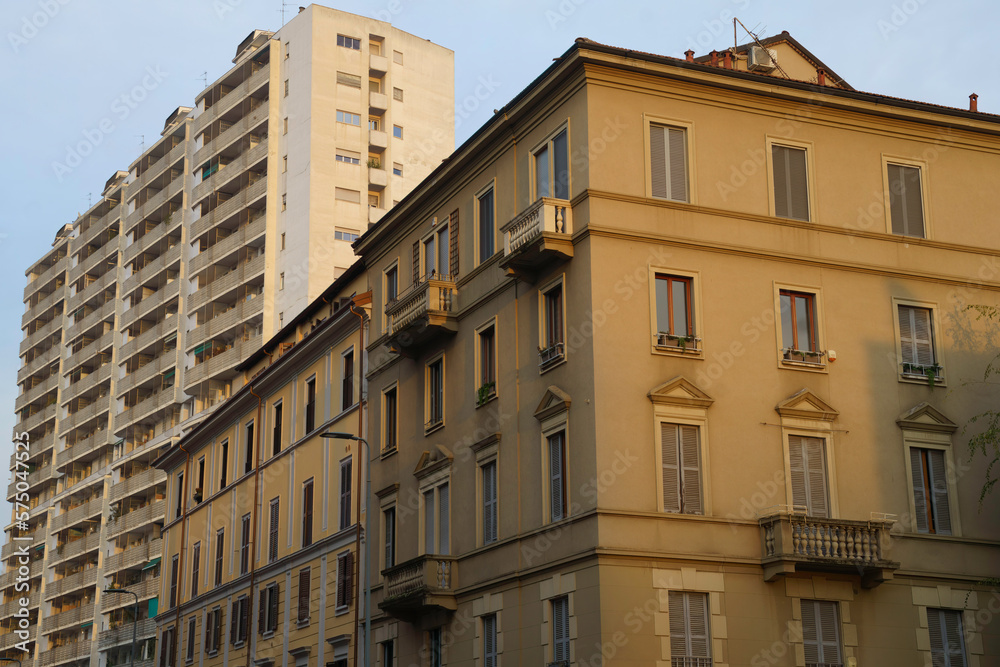 Old and modern buildings along via Ferrucci in Milan