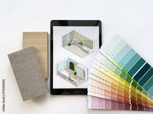 Creative tablet set, color palette, material sample on white background. Concept: selection of colors and materials for children's furniture. Workplace of an interior designer