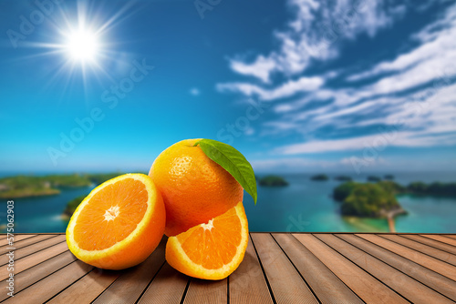 Oranges fruits on a table in front of a tropical sea - blurry background