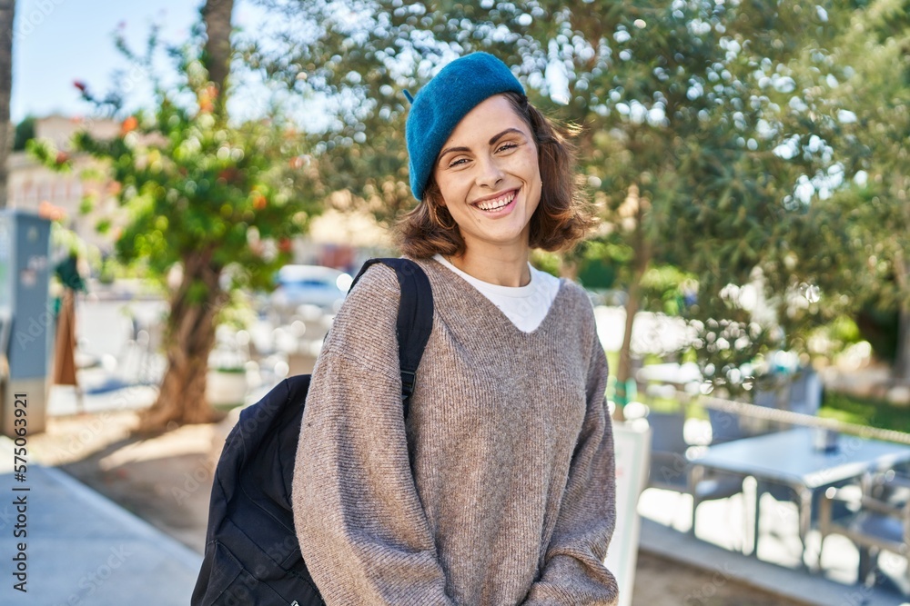 Young caucasian woman tourist smiling confident walking at park