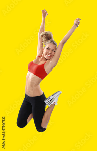 yellow colourful background beyond a fitness jumping girl