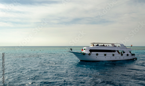 tourists on white boats in the Red Sea Egypt © Sofiia