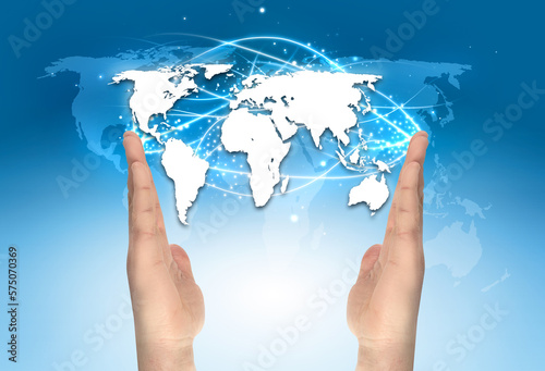 world map among the hands over a gradient blue background