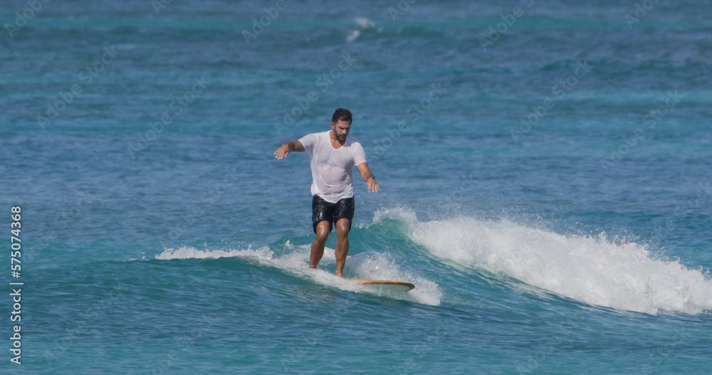 Man surfer surfing ocean waves Man surfer surfing ocean waves